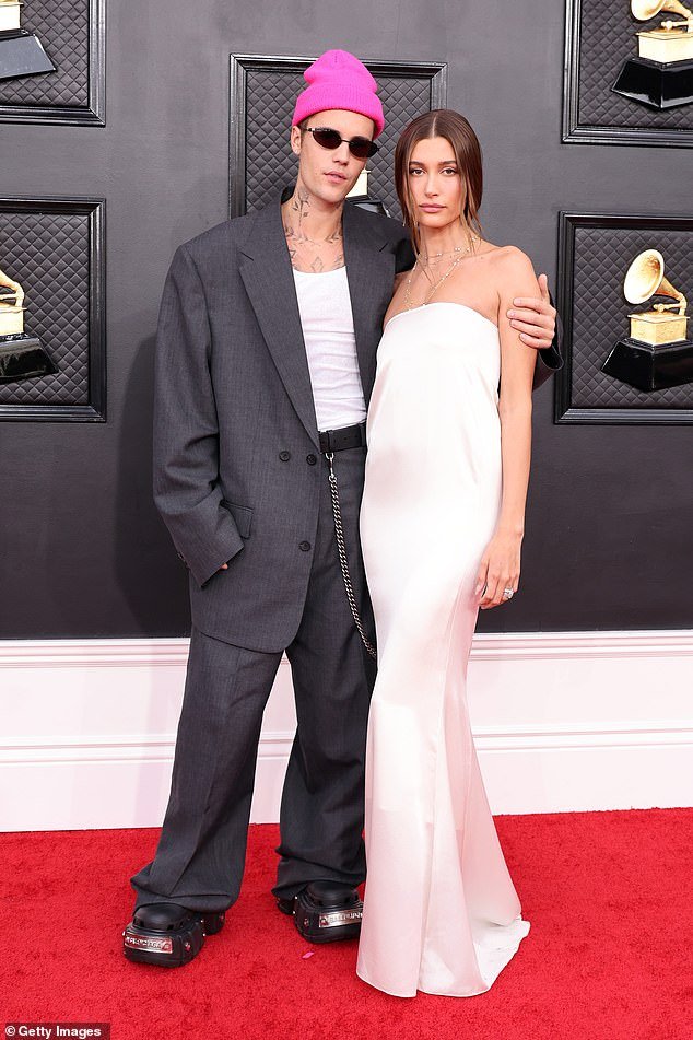 'Justin and Hailey are very much aware that if they were to split it would likely lead to a complete tailspin for Justin that he could struggle to recover from,' the source said. 'Hailey is his rock' (pictured in April 2022)