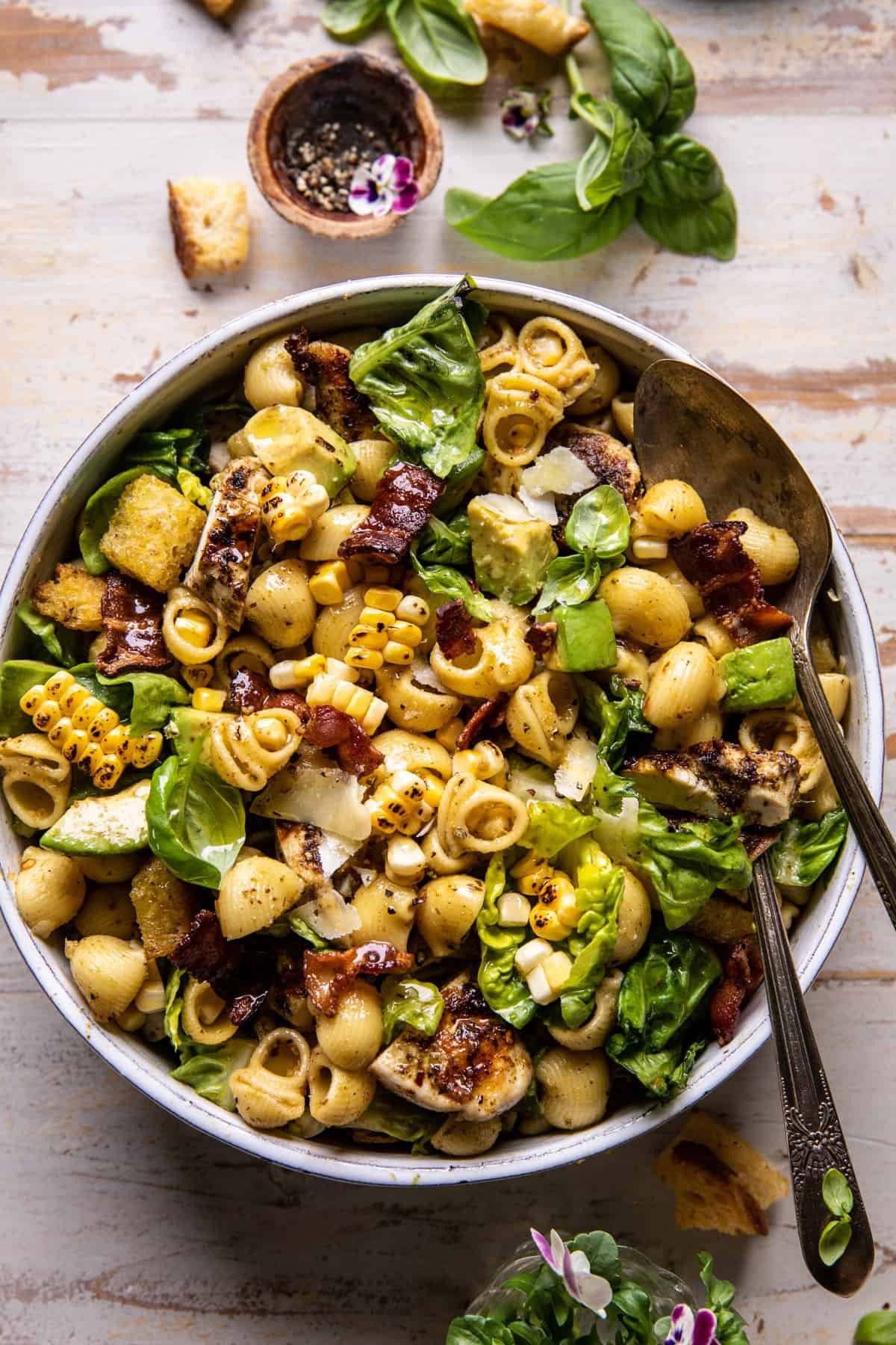 Pesto Chicken, Corn, and Avocado Bacon Pasta Salad | halfbakedharvest.com