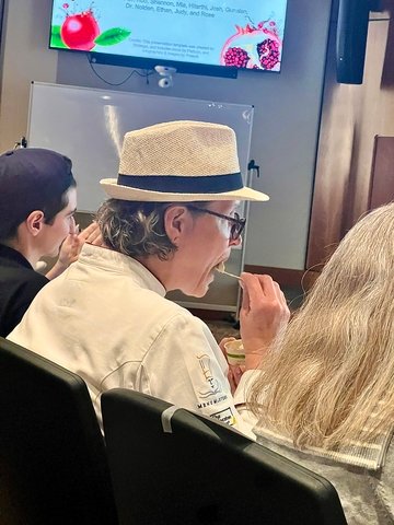 Judge Pamela Adams, UMass Dining executive pastry chef, tries a sample during the 2025 Ice Cream Contest on May 8, 2025