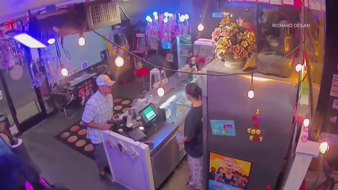 A man robbed an ice cream shop at gunpoint and it was caught on camera