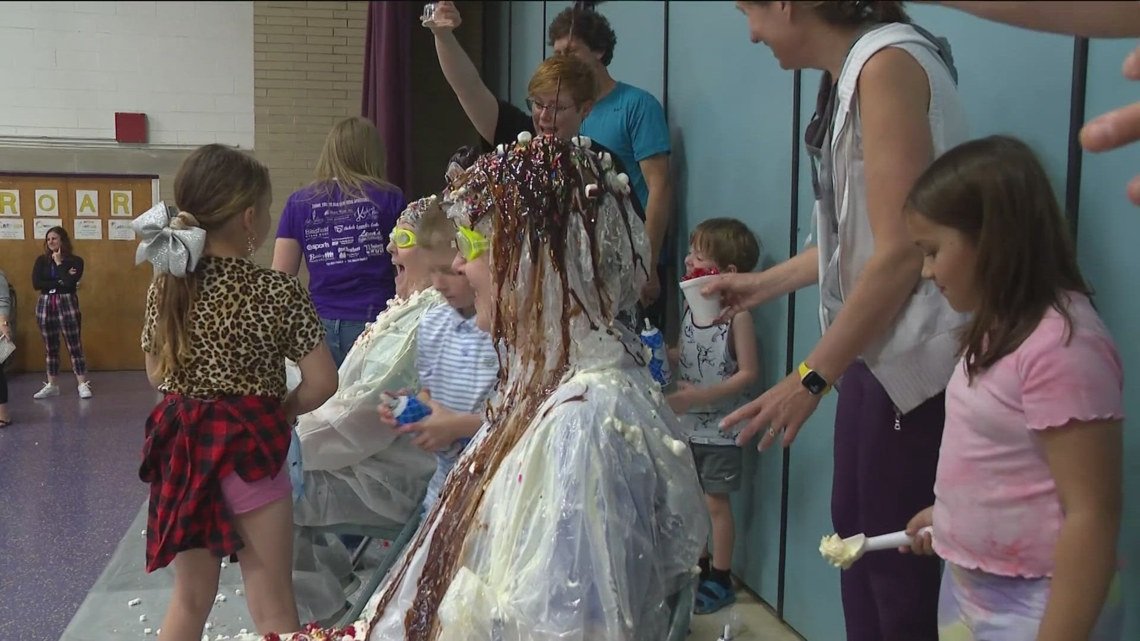 Blissfield students have fun turning adults into ice cream sundaes