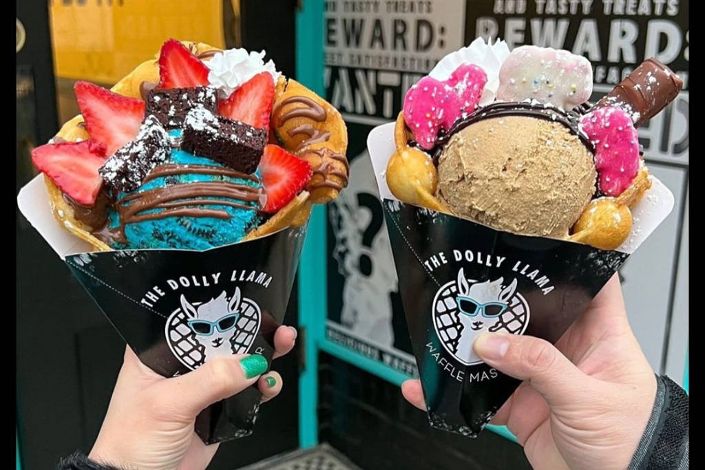 Image shows two ice creams served in bubble waffles from The Dolly Llama ice cream shop in Dallas.