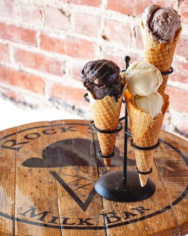 From left, scoops of dark chocolate, blackberry Earl Grey, and honey lavender ice creams fill from-scratch cones at Rock Salt Milk Bar. (Shaleen Munsell)